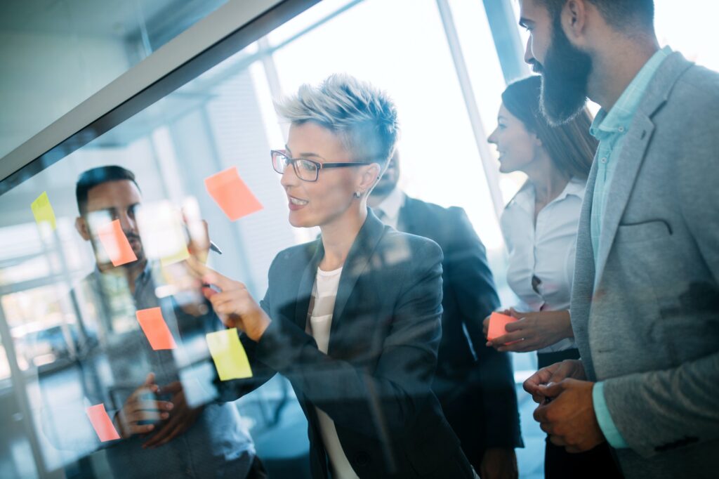 Business people planning strategy in office together